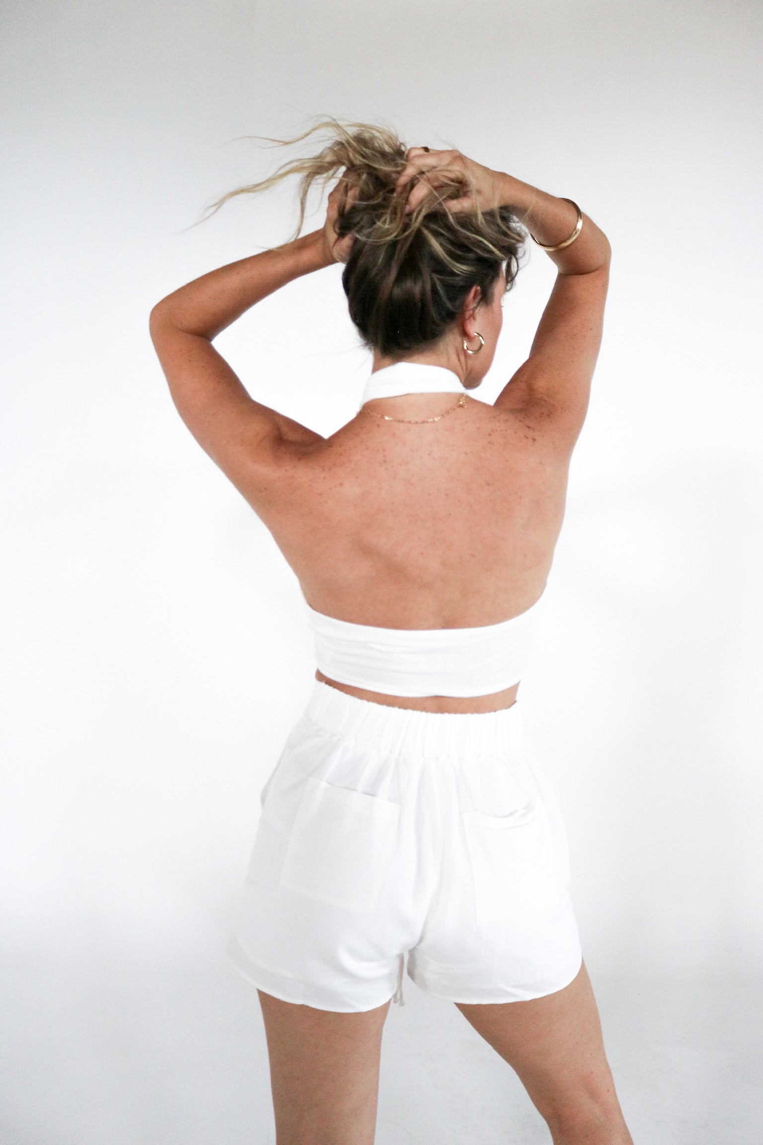 Keyhole Cross Neck Tie Top in Ivory with matching White Trouser Shorts. The Color Coded Collection. Scarlette The Label, an online fashion boutique for women.