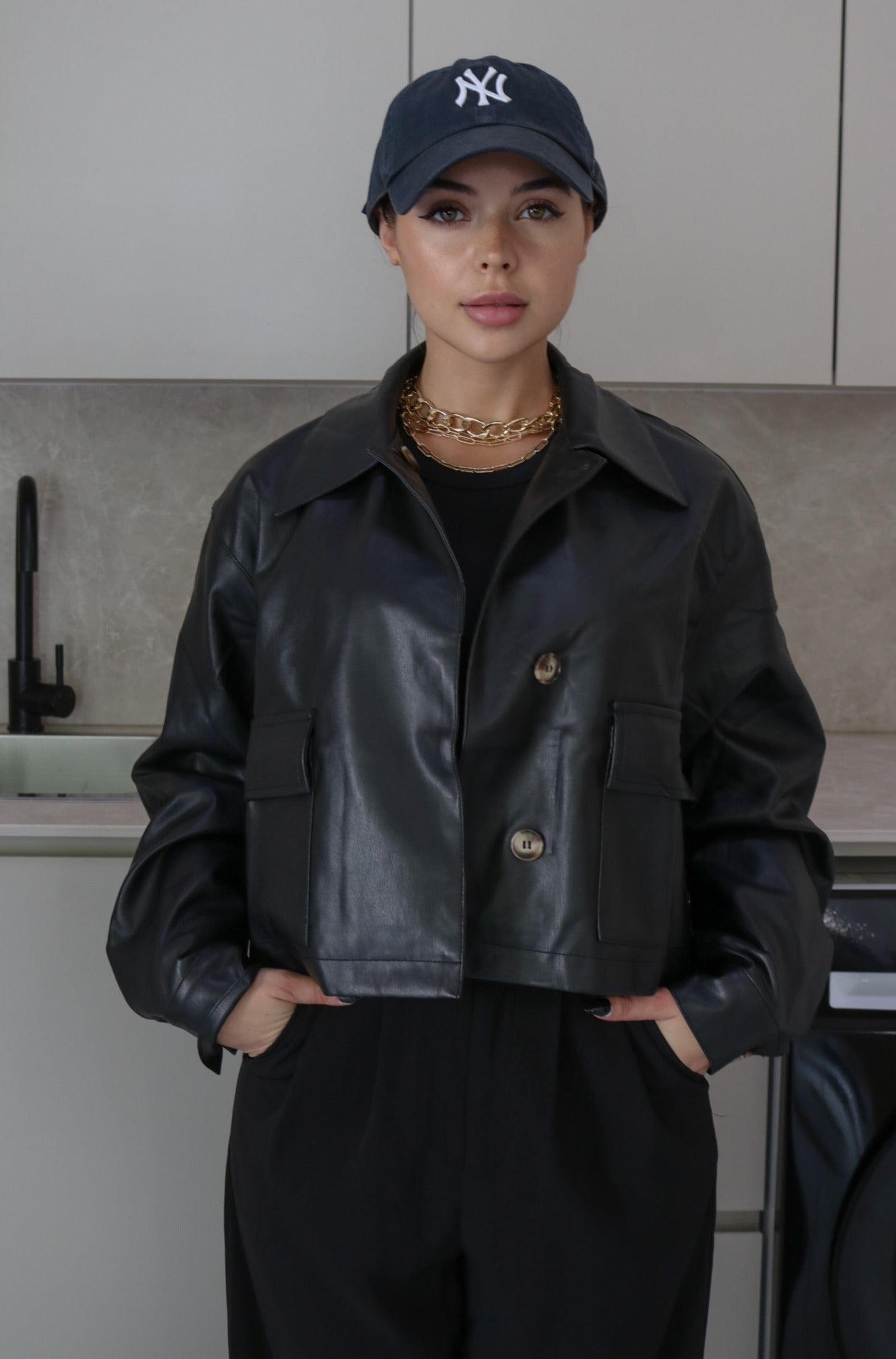 Collared Faux Leather Jacket in Black. Scarlette The Label, an online fashion boutique for women.