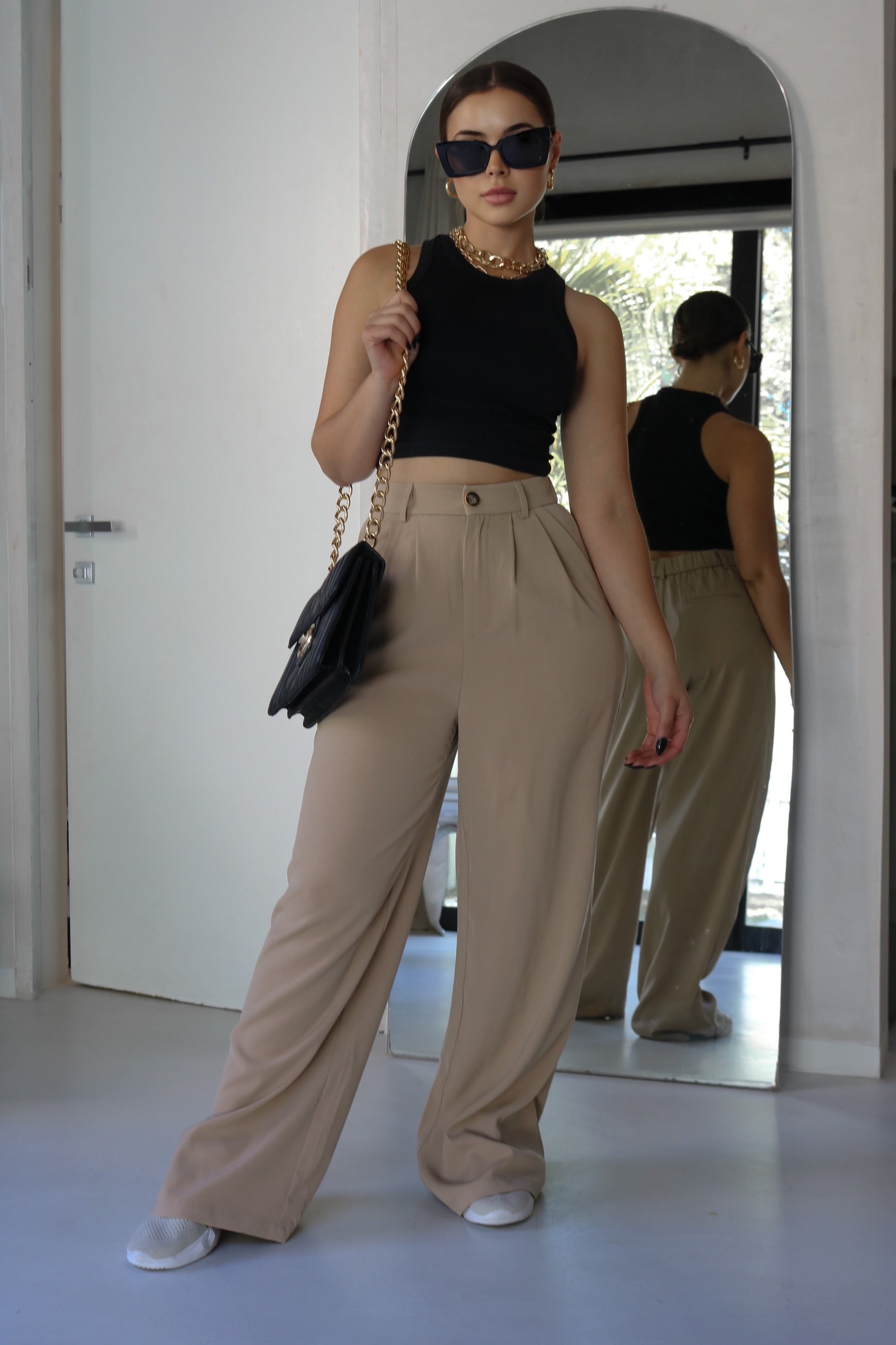 Ribbed Muscle Tank Top in Black. Scarlette The Label, an online fashion boutique for women.