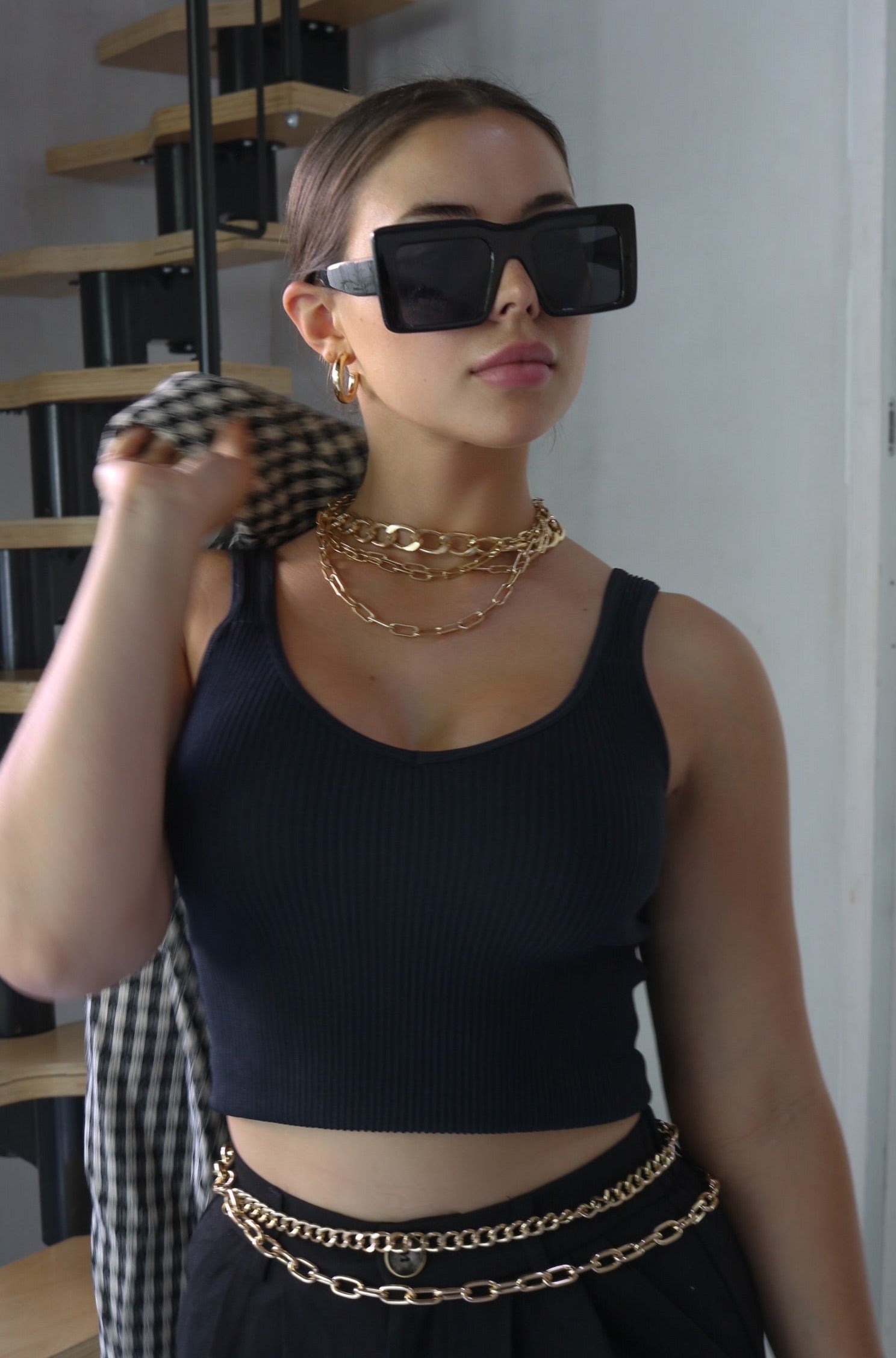 V Neck Ribbed Tank Top in Black. Scarlette The Label, an online fashion boutique for women.