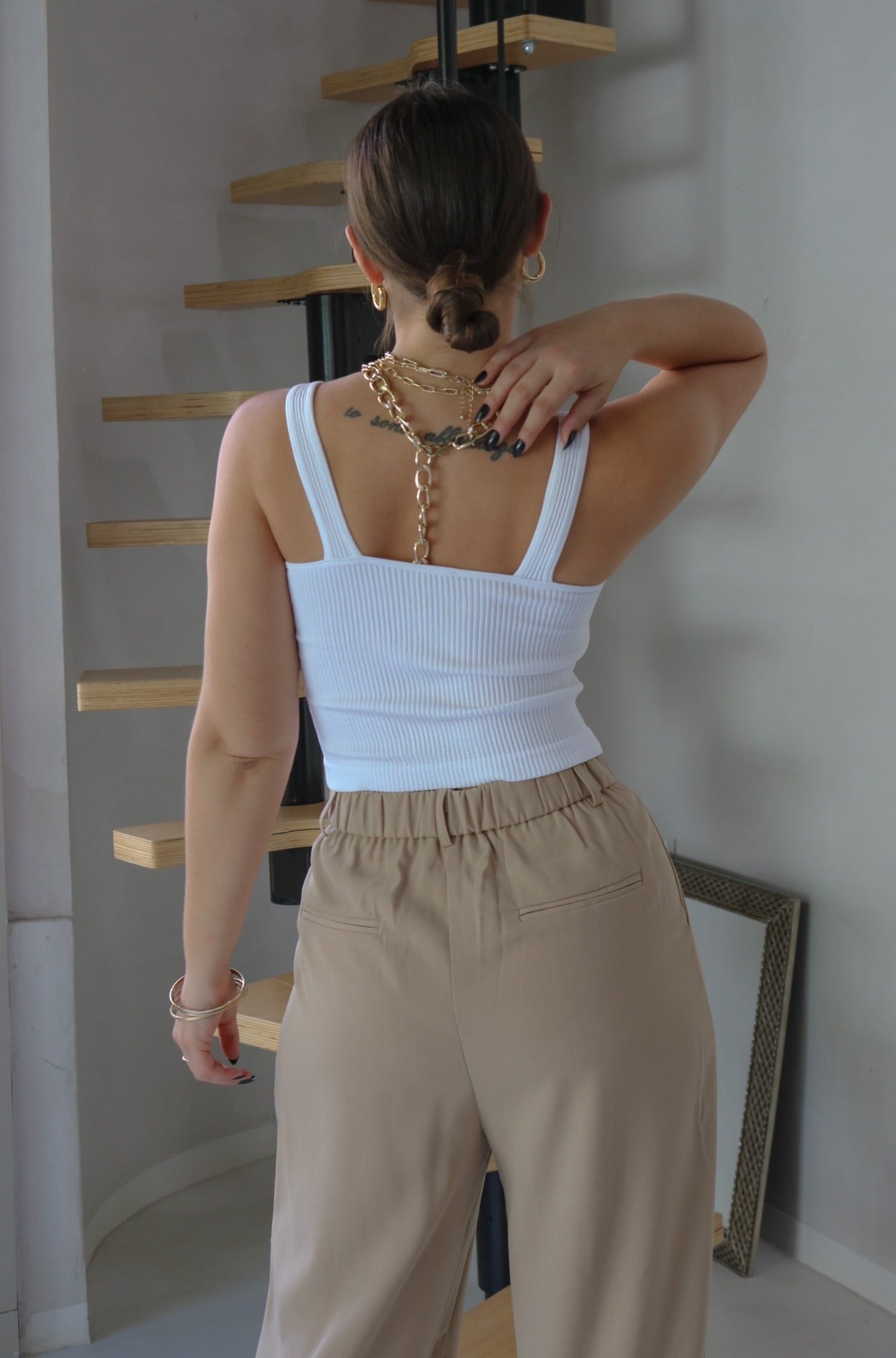V Neck Ribbed Tank Top in White. Scarlette The Label, an online fashion boutique for women.