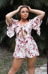 Flare Sleeve Cut Out Romper in Wine Floral for Scarlette The Label, an online fashion boutique for women.