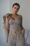V Neck Ribbed Tank Top in Nude. Scarlette The Label, an online fashion boutique for women.