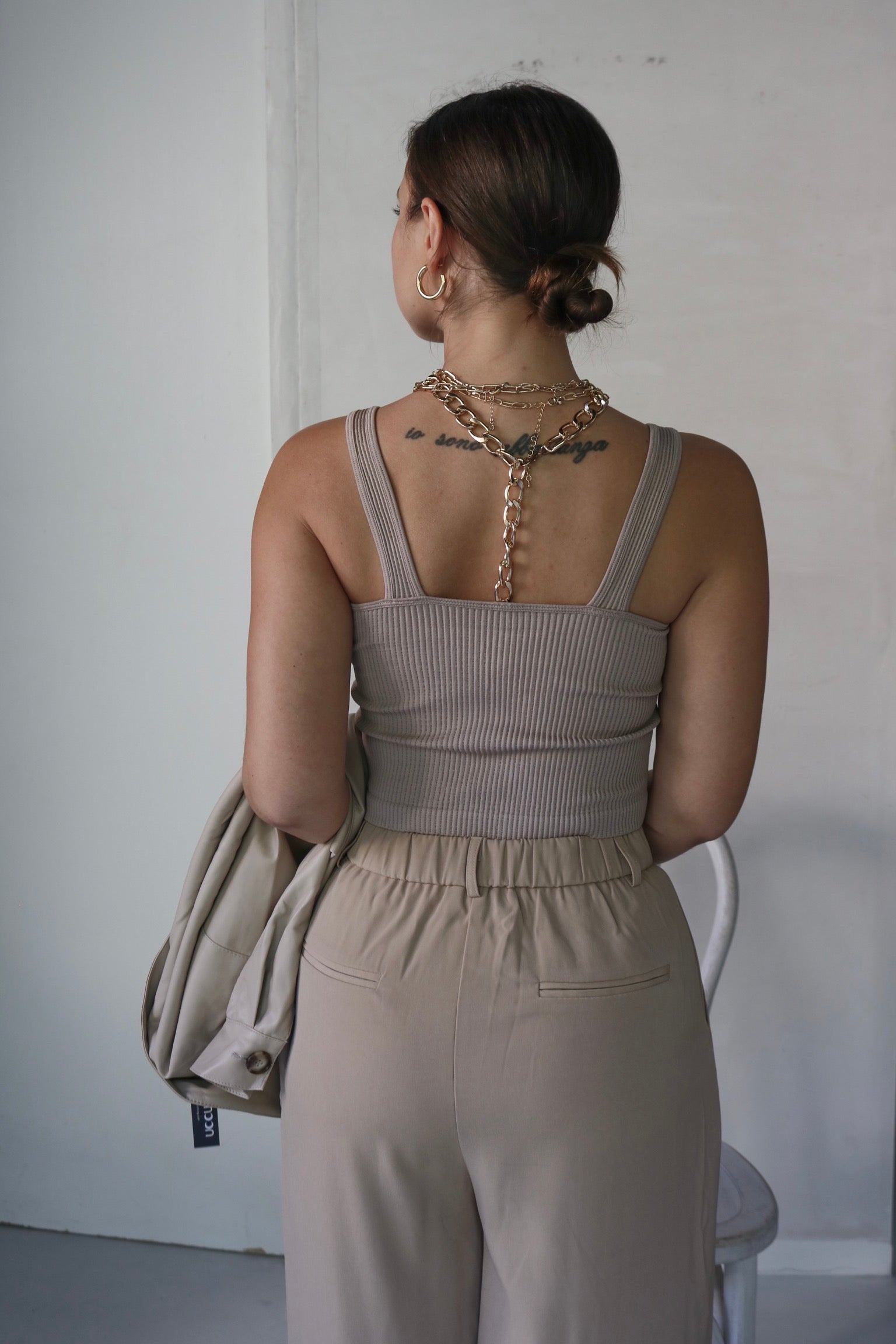 V Neck Ribbed Tank Top in Nude. Scarlette The Label, an online fashion boutique for women.