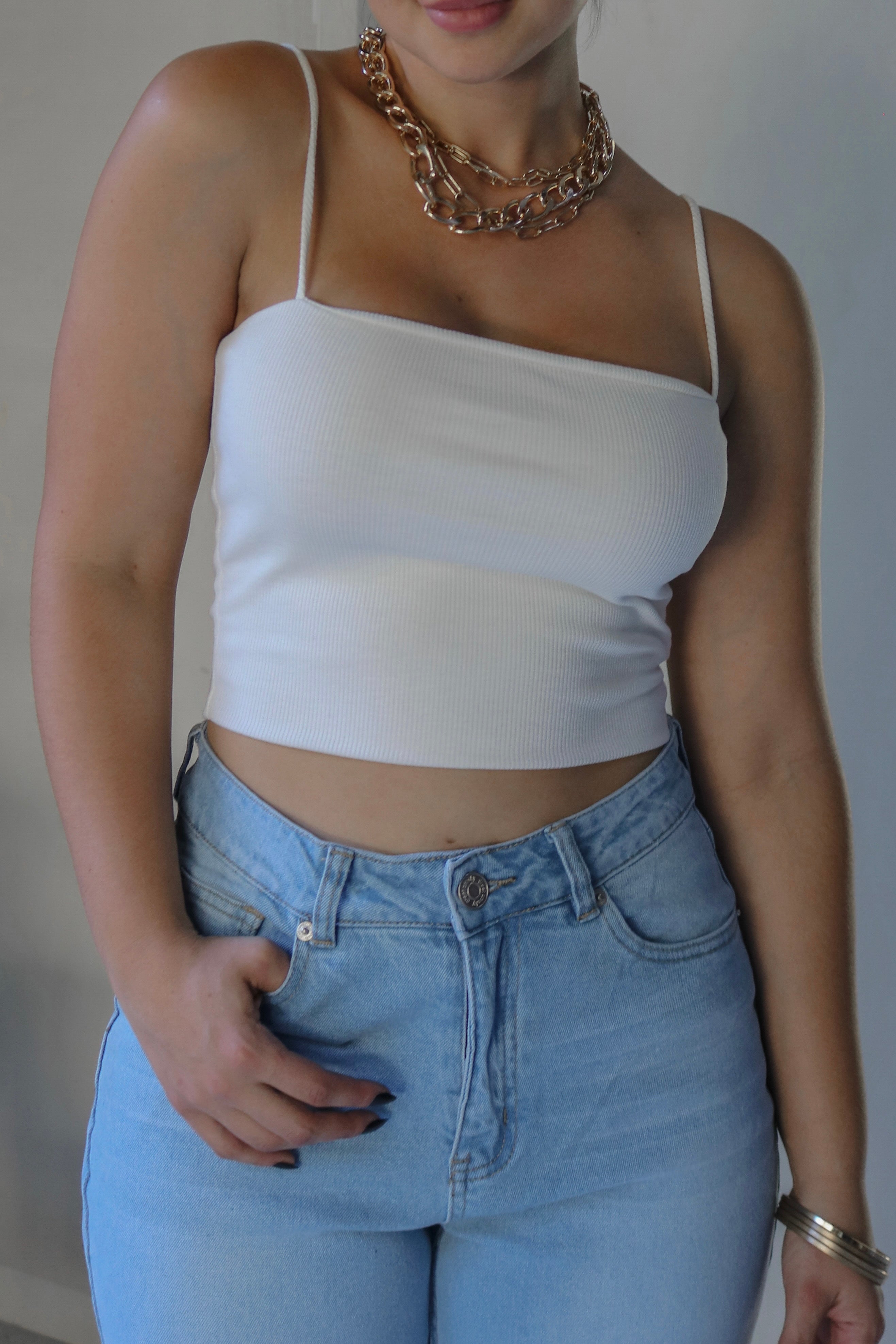 Spaghetti Tank Top in White. Scarlette The Label, an online fashion boutique for women.